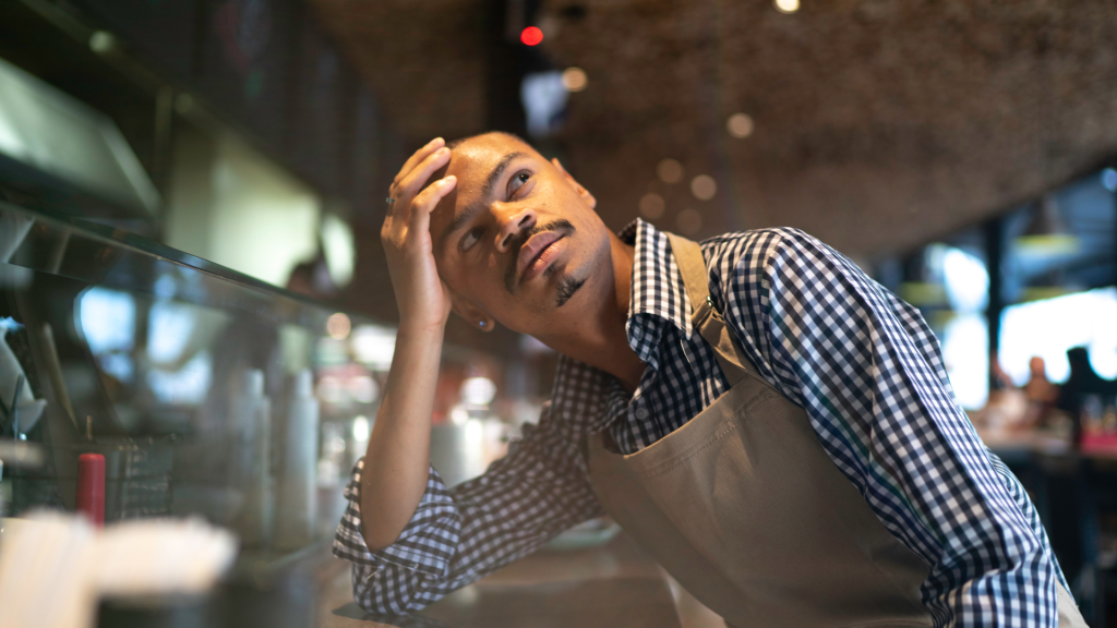 man at work with his head in his hands